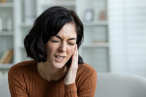 Woman with TMJ Jaw Pain